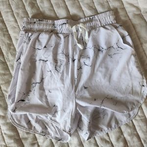 Buffbunny Flo shorts, white marble M and XS